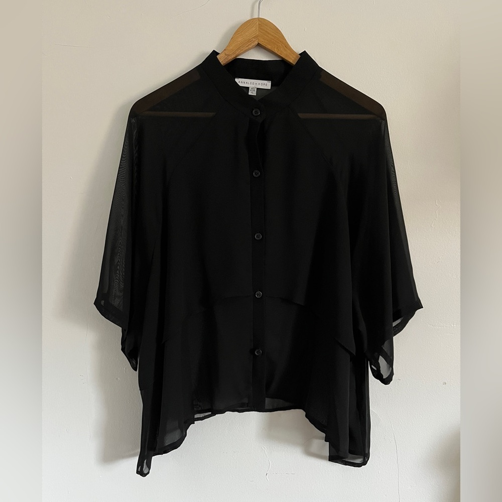 Sheer black tiered detail blouse
